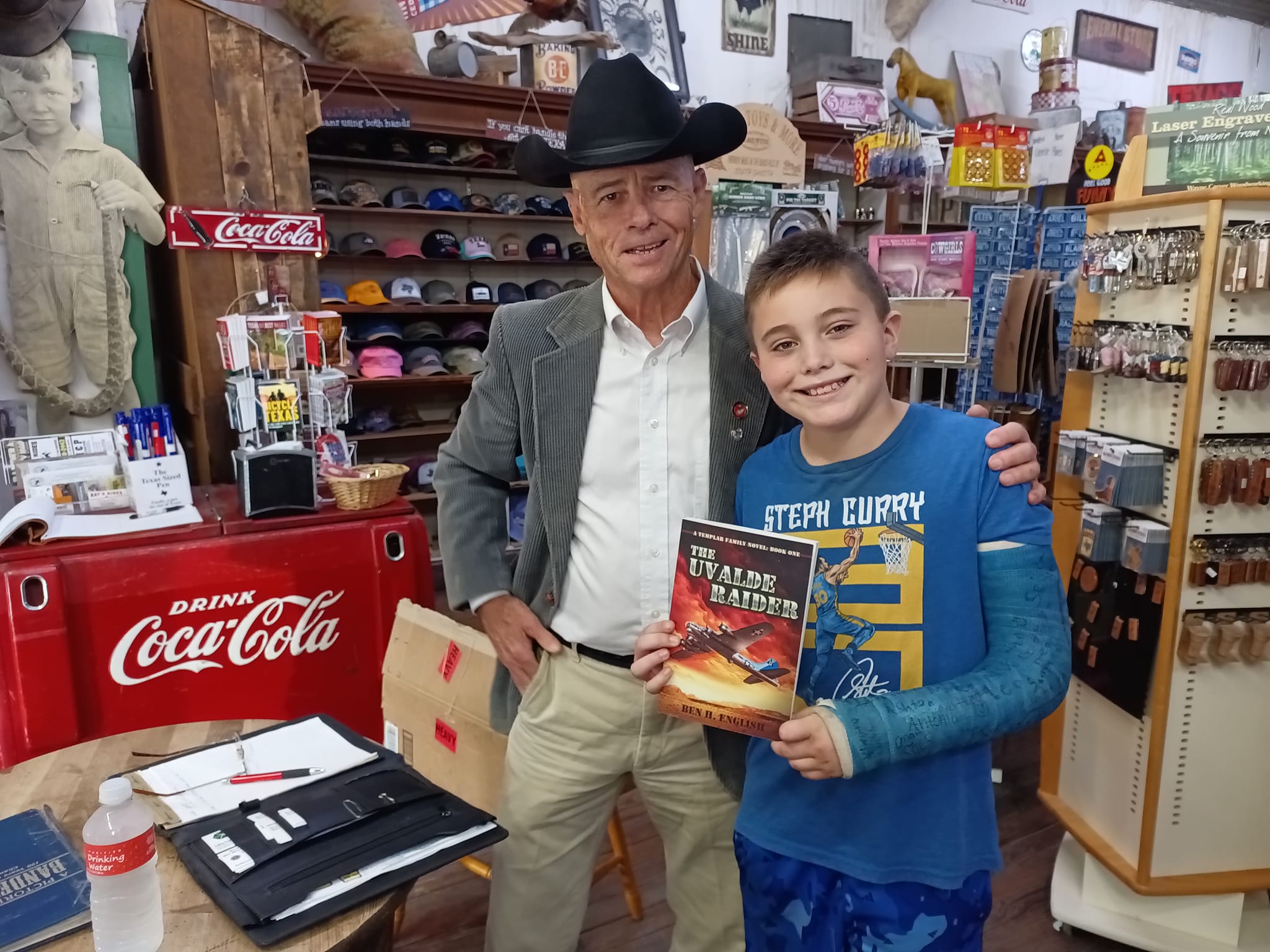 Author Ben H. English stands with young reader who just purchased a copy of Uvalde Raider